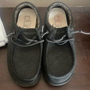 GUC Hey Dudes Y4. My son wore them to church a few times.